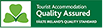Quality assured accommodation logo with green clovers.