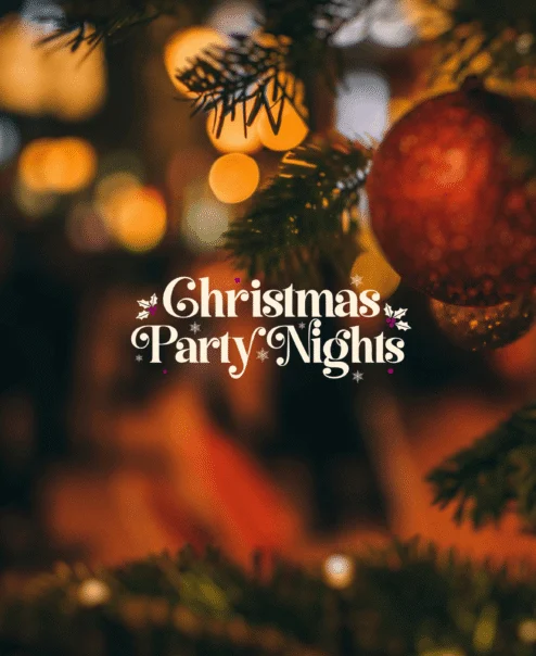 Festive Christmas scene with families enjoying a holiday gathering, warm lights and decorations.