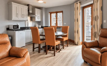 Cosy hotel suite with dining area and comfortable seating for families.